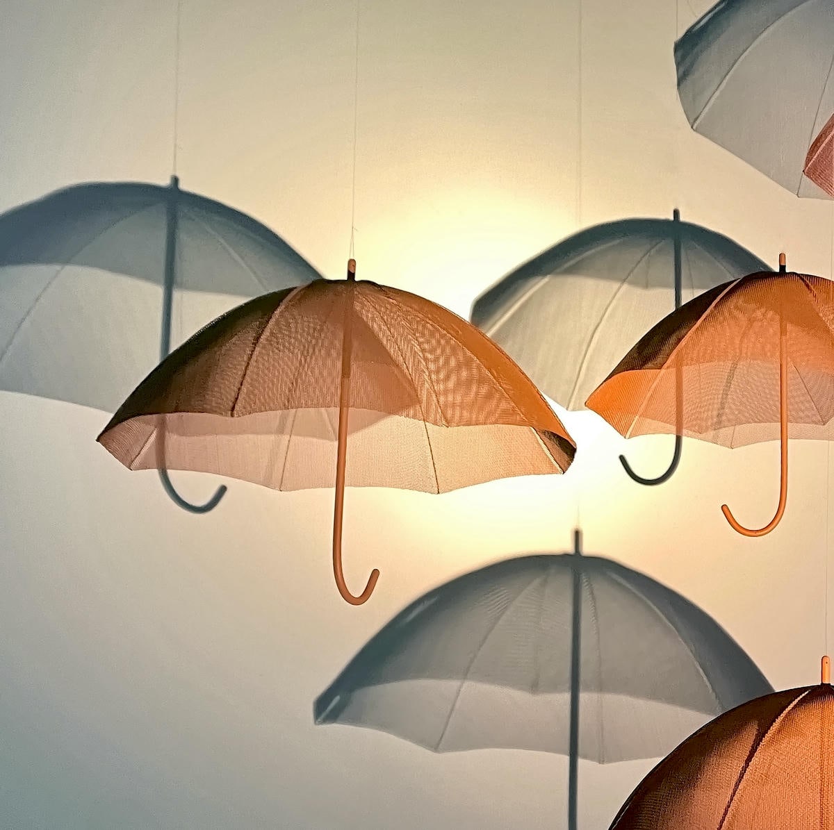 Umbrella sculptures made from bronzemesh for the RHS Chelsea Flower Show