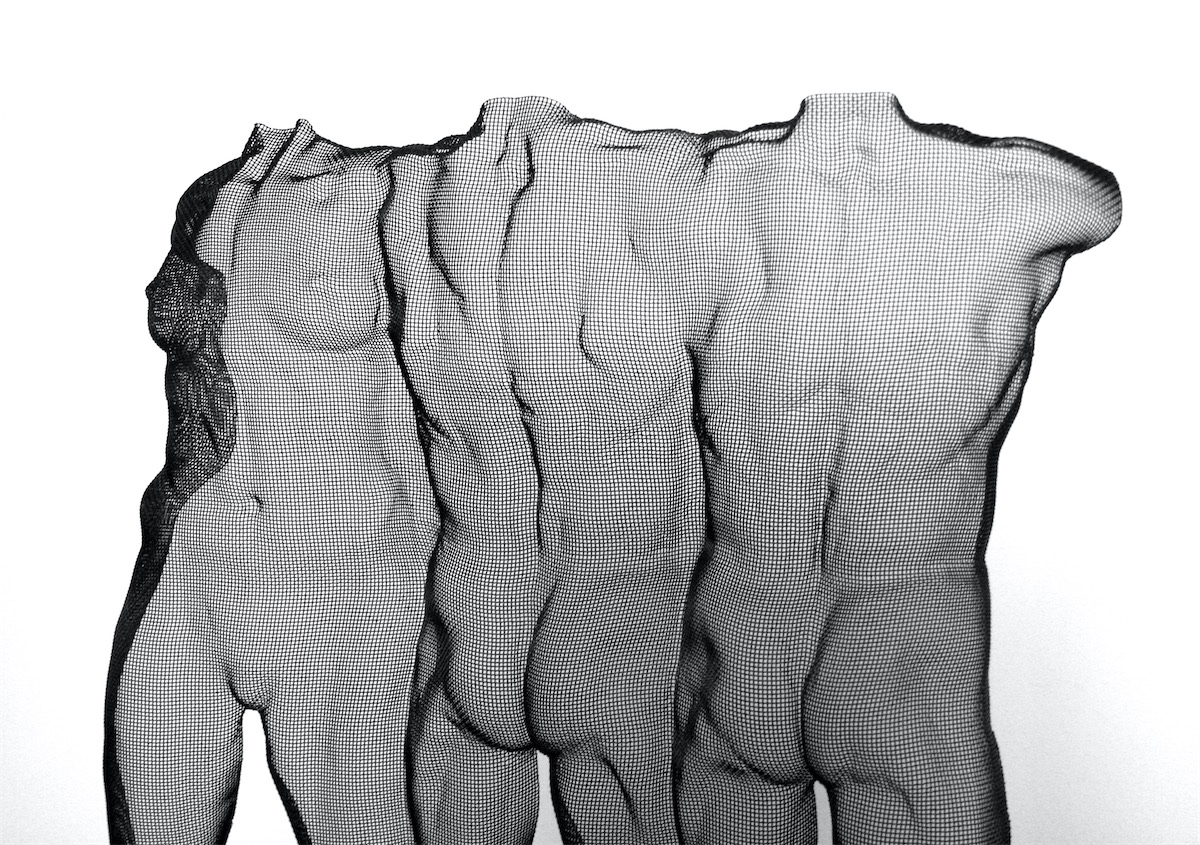 detail of a wire sculpture depicting a female and two male nude torsos. Art by sculptor David Begbie