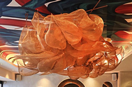 A large bronze ceiling sculpture at Regina, Birmingham, installed 2025