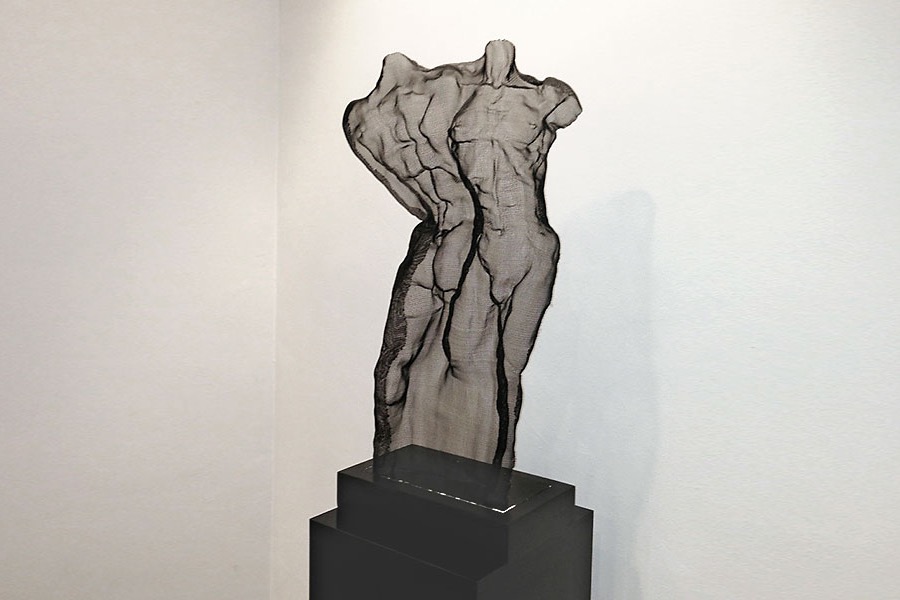 Sculpture composition of two male figures at Johnson&Johnson, UK