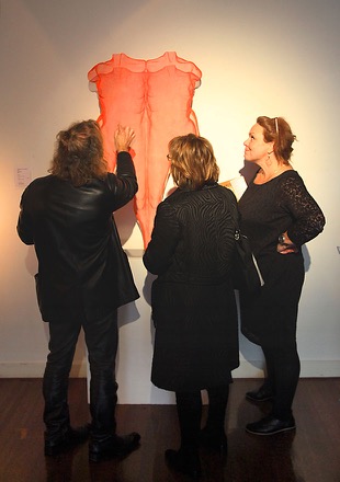 Nude body sculpture, wall-mounted