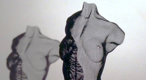 detail of a female bust made of wire with shadowplay
