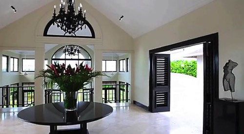 elegant interior in luxurious guesthouse Jamaica with modern figurative sculpture