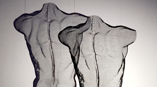 Detail of a body with muscle details - modern art by British sculptor